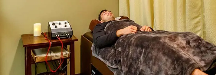 Chiropractic Dalton GA Patient On Intersegmental Traction Table Patient On Intersegmental Traction Table