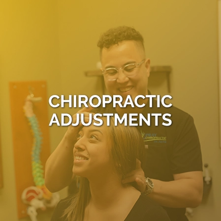 Chiropractor Eric Rivera Adjusting Patients Neck Behind Yellow Overlay