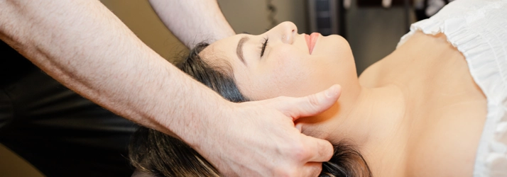 Patient Receiving Adjustment On Their Neck